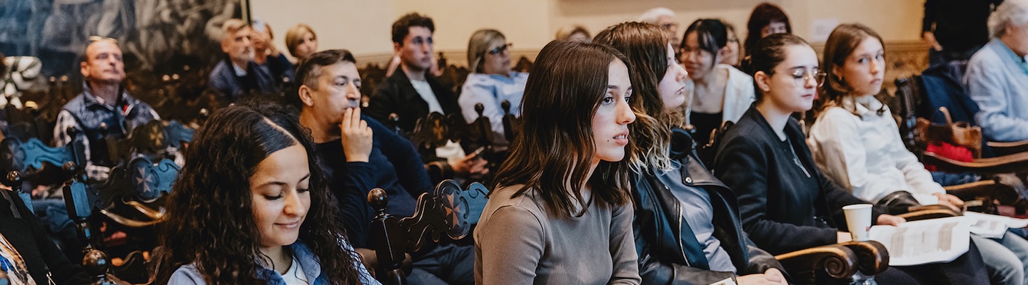 Pubblico di una conferenza in Normale